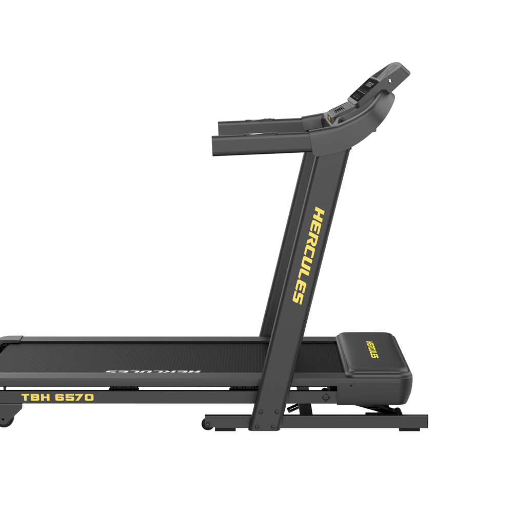 Side view of a dark gray Hercules treadmill (TBH 6570) with a compact console at the front and yellow branding along the upright frame.
