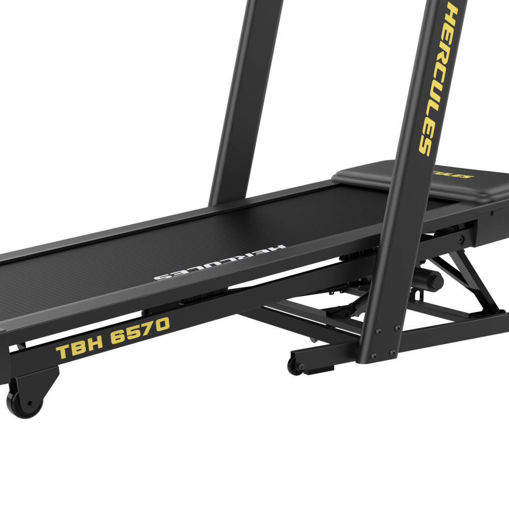 Close-up of a Hercules TBH 6570 treadmill belt and sturdy black frame with wheels at the base.
